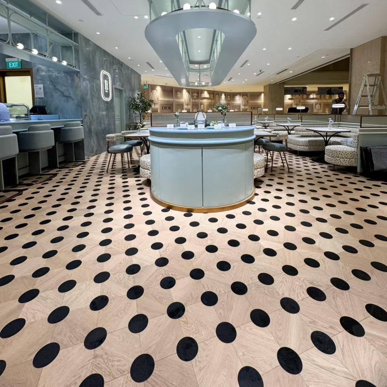 Rituel Cafe with Le Médaillon parquet flooring